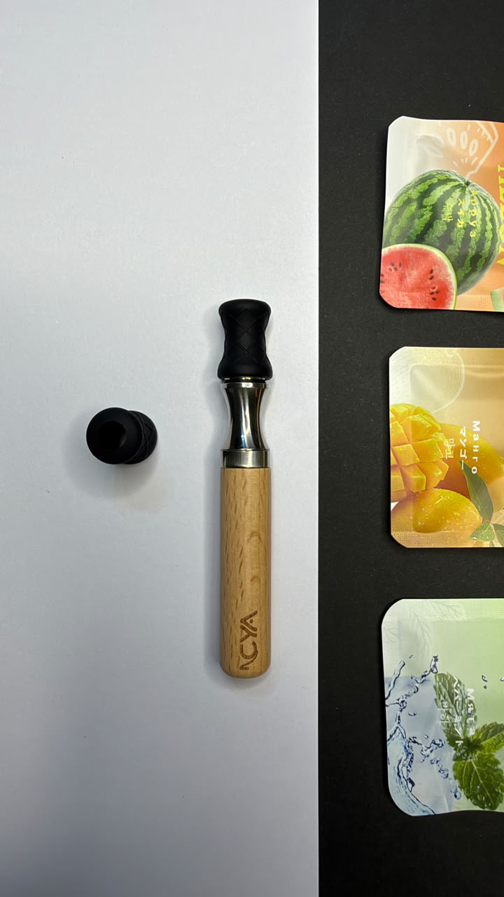 NCYA standard mouth tip beside and fitted to an ivory Original inhaler